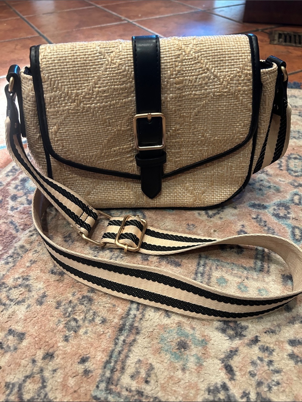 Neutral Woven Crossbody Bag with Black Trim and Striped Strap